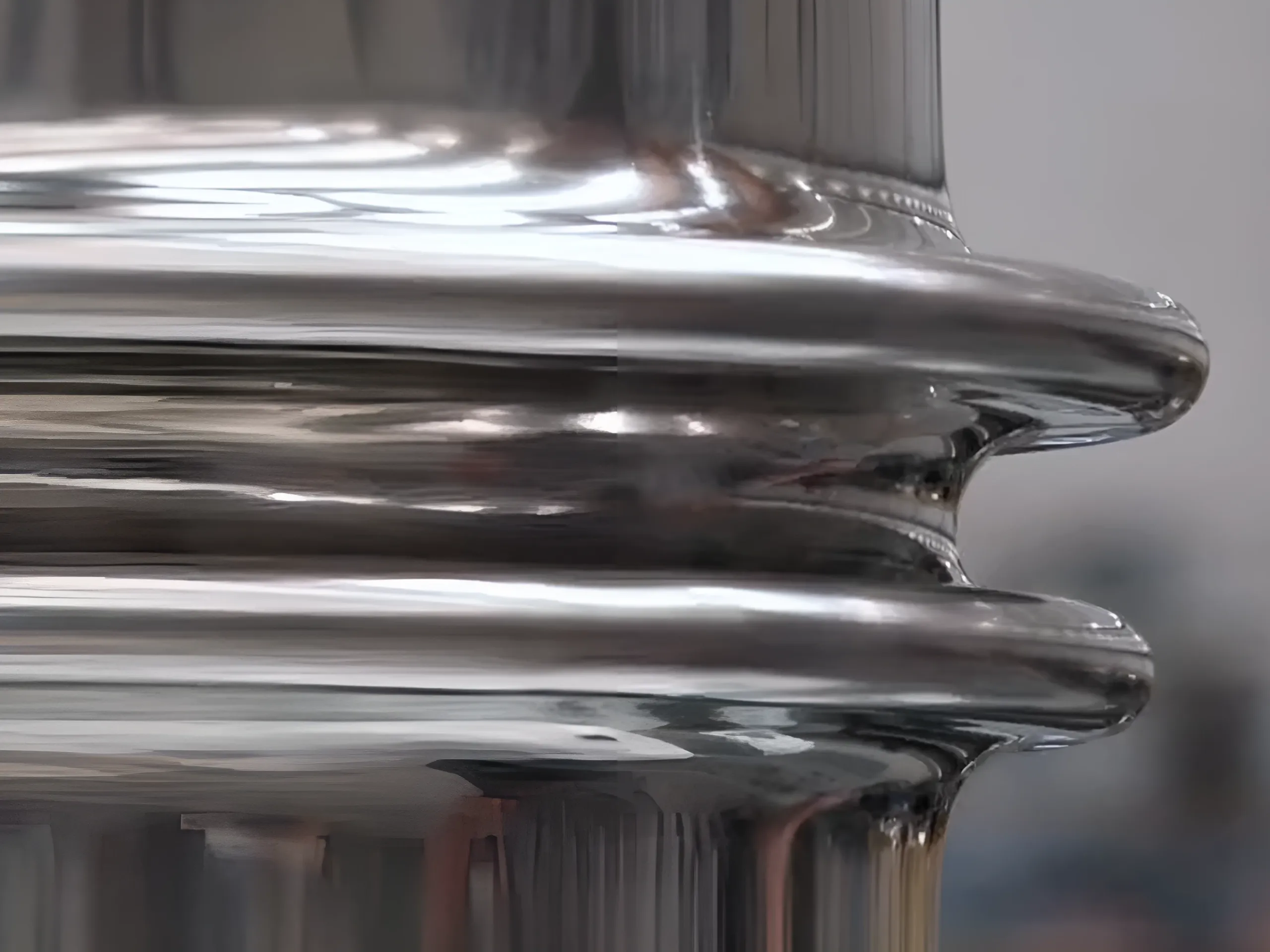 How are metal bellows formed by hydraulic presses?